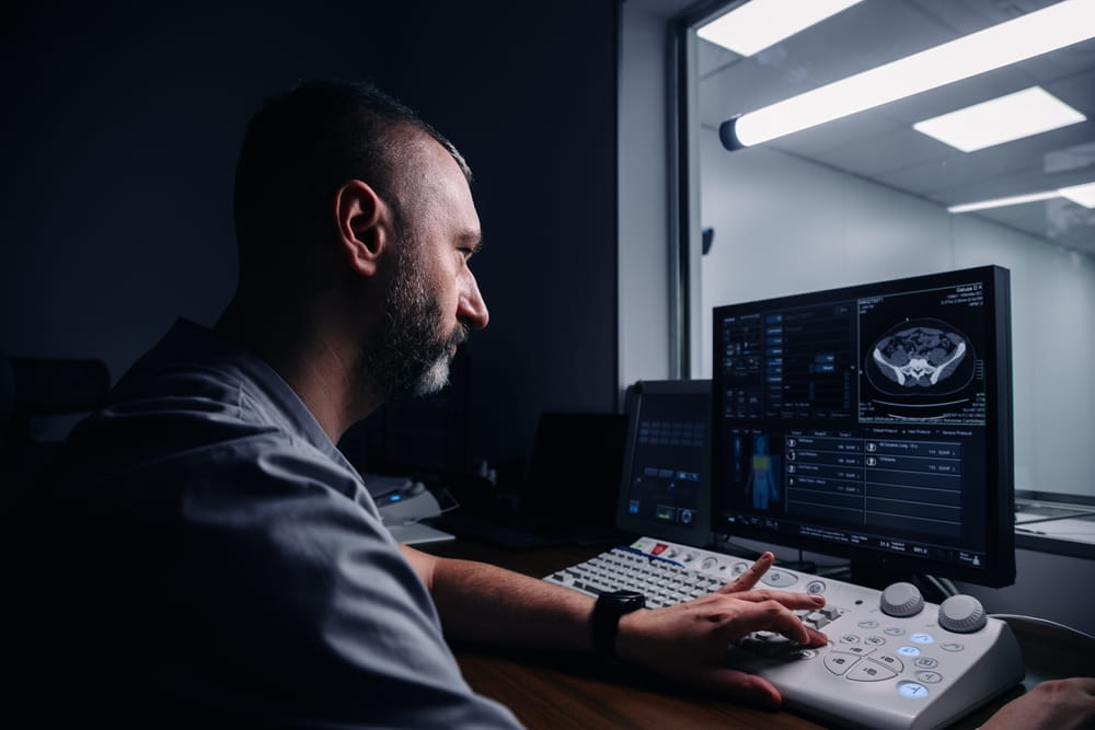 Doctor reviewing medical imaging related to pre-existing conditions and Florida medical negligence claims